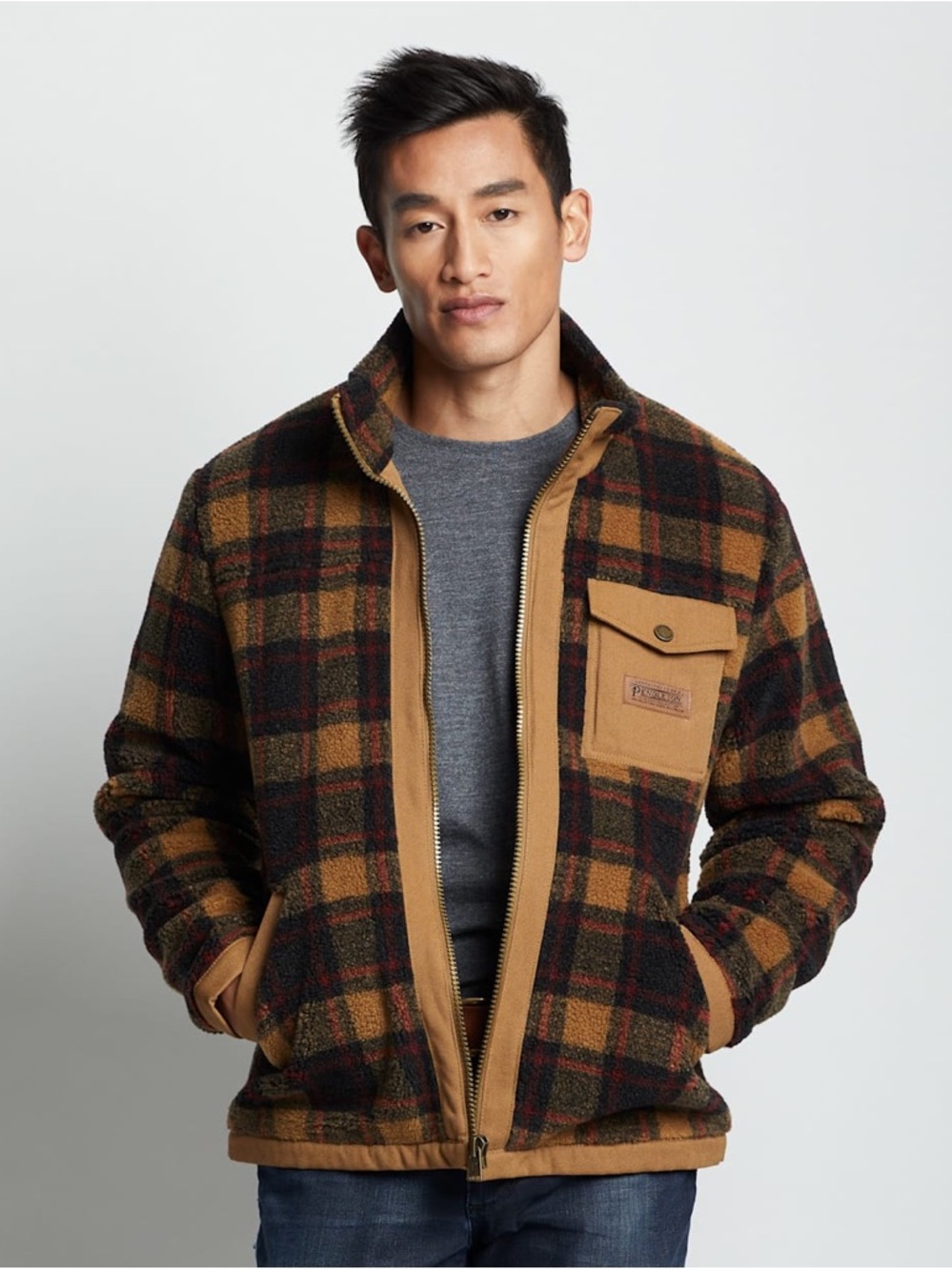 Pendleton Jacket with Blue Label on Tan Fabric
